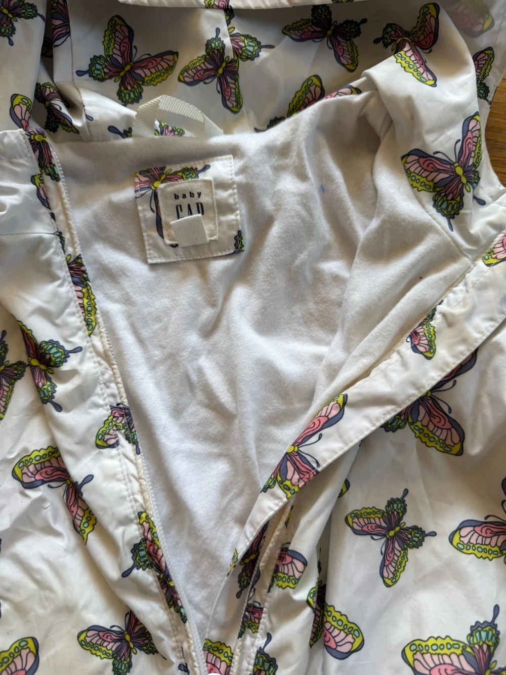 Old Navy White Hooded Raincoat with Pink and Green Butterfly Print